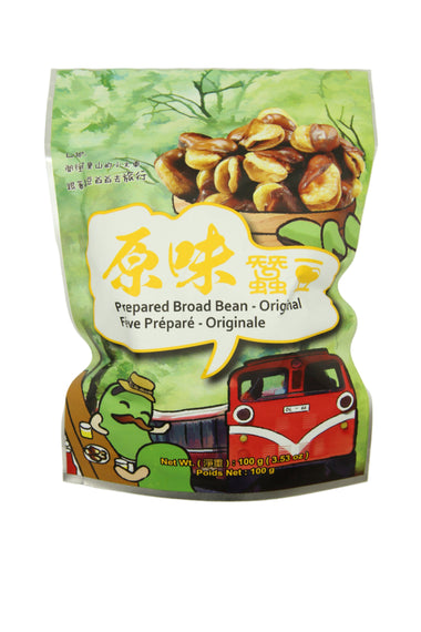 Packaged food product with a green and white label featuring a cartoon character and a red vehicle.